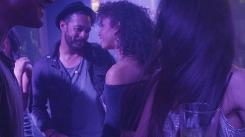 Friends enjoying at the dance party in nightclub