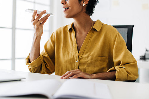 Female accounting professional talking on a phone call