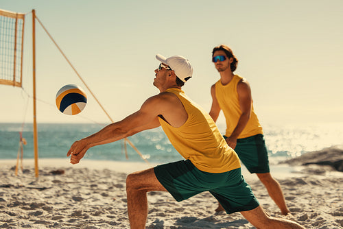 Australian beach volleyball team in action: Intense tournament match on sandy shore