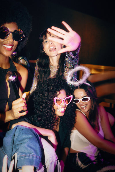 Group of friends enjoying a fun night out at a lively event