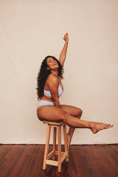 Woman celebrating her natural body in a studio