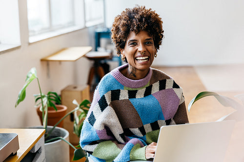 Creative professional working at a cozy co-working space