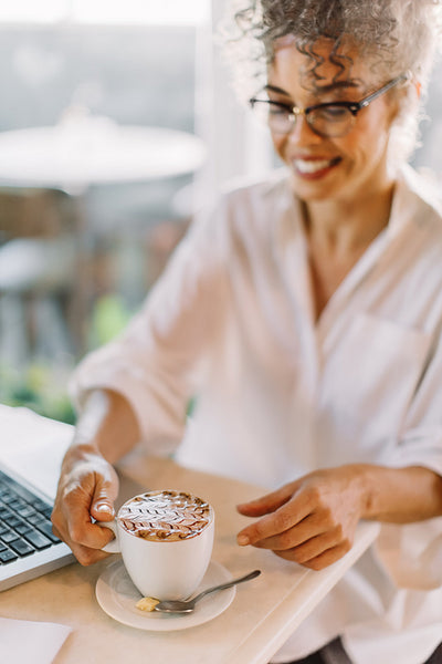 Businesswoman having coffee in a cafe