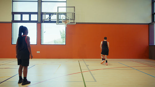 Friends enjoying a game of basketball