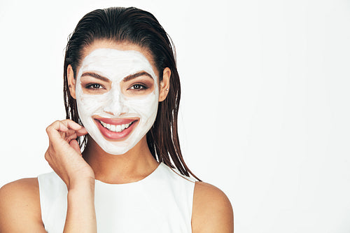 Woman with a cosmetic facial mask