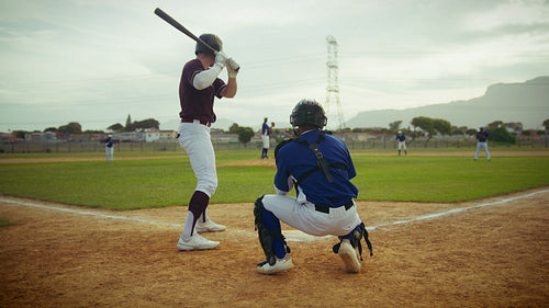 Baseball team celebrates a successful play with high fives