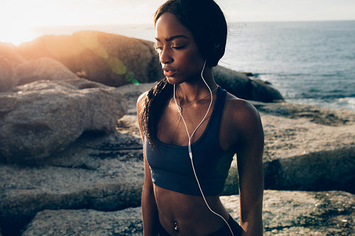 Fitness female relaxing after intense physical training