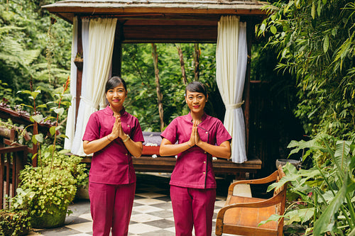 Massage therapists welcoming guest
