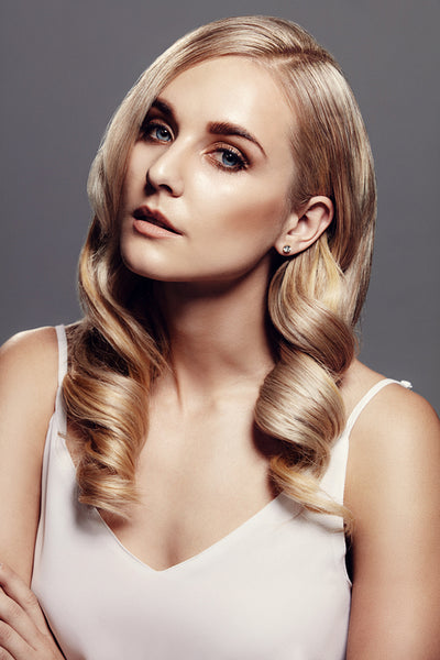 Stylish female model with perfect skin and blond hair