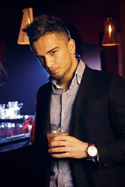 Handsome Man Holding a Glass of Whiskey
