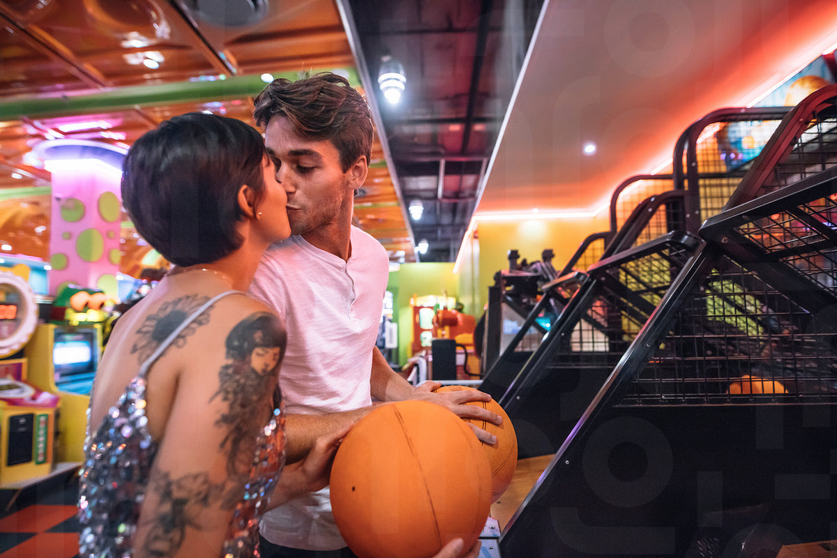 Romantic couple kissing at a gaming arcade – Jacob Lund Photography ...