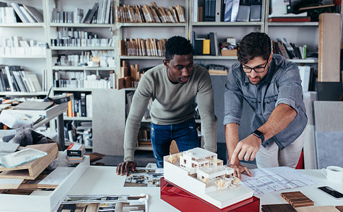 Architects working on construction project in the office