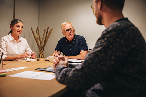 Business partners interviewing new candidate of a job