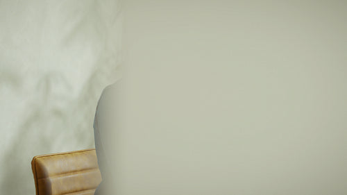 Businesswoman typing on laptop in modern office