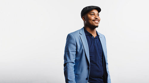 Smiling businessman in cap