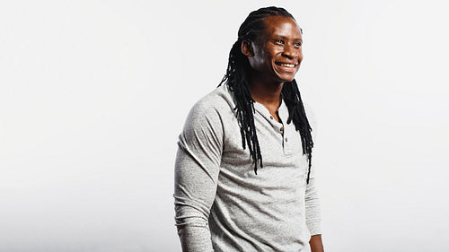 Cheerful african man with dreadlocks