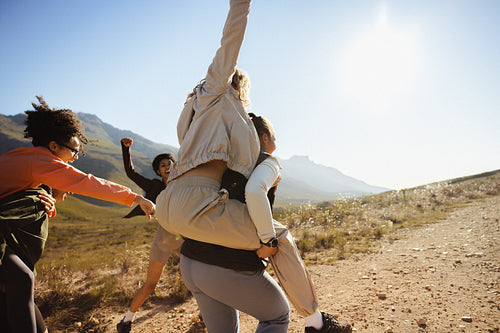 Friends celebrating together in the outdoors