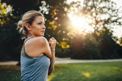 Fitness woman stretching in the park