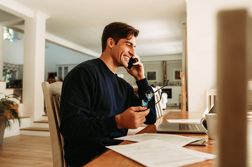 Businessman staying home working 