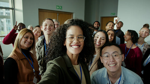 Smiling business people take a selfie