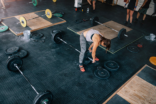 People exercising in crossfit gym