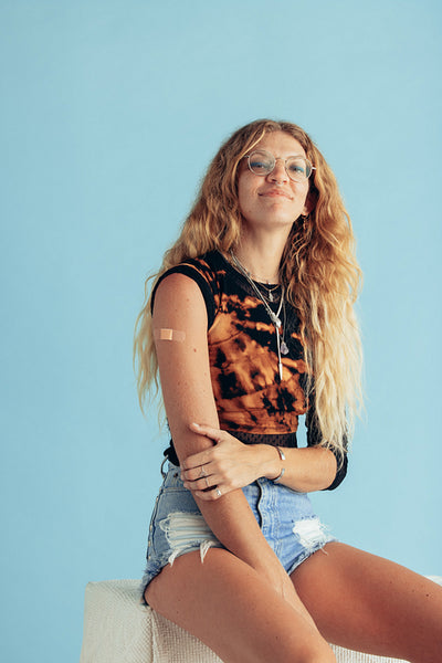 Woman feeling proud after getting vaccine