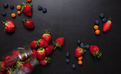 Fresh fruits scattered on table