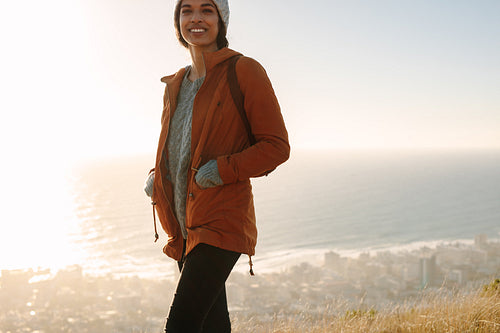 Woman hiking on mountains in winter