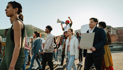 A diverse group of protestors demonstrating together for a common cause