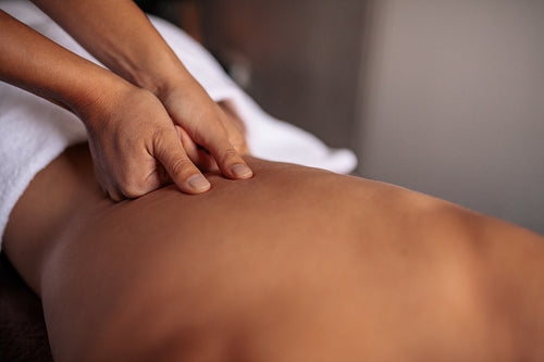 Woman getting massage spa treatment