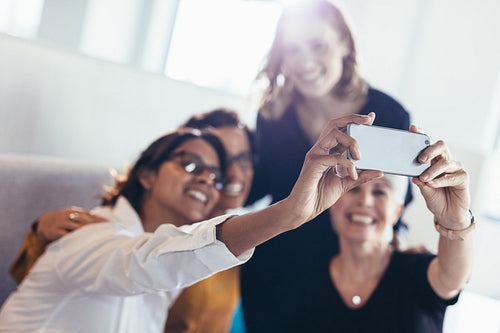 Group of business women taking selfie