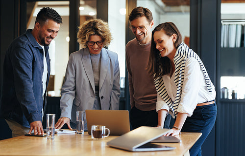 Successful business team connecting with their clients on a video call