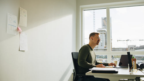 Executive working at desk in office