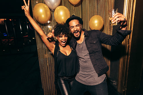 Couple having fun at disco party