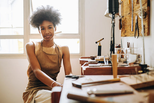 Female jewelry making artist