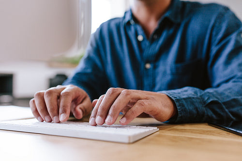 Businessman hands typing on keyboard 