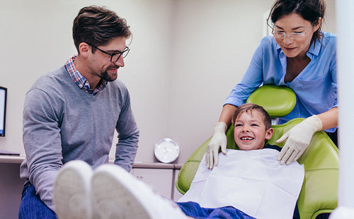Little boy visiting dentist at clinic