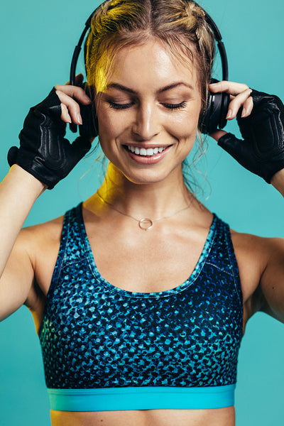Sportswoman listening to music