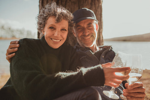 Senior couple enjoying camping holiday