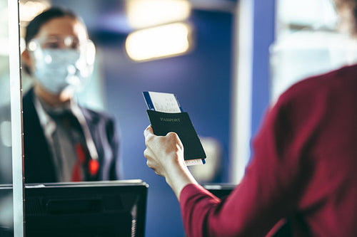 Woman doing check-in at the airport