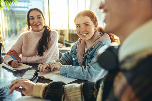 Cheerful group of students in a high school