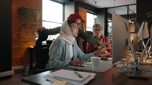 Diverse business women working on a social media advertising campaign