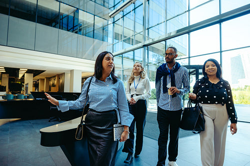 Corporate orientation for new hires at modern office building
