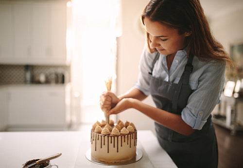 Chef making a cake at home