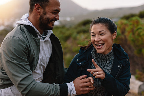 Young couple having fun outdoors on a vacation