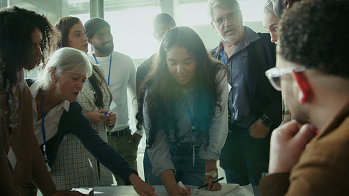 Professionals collaborate during a business meeting