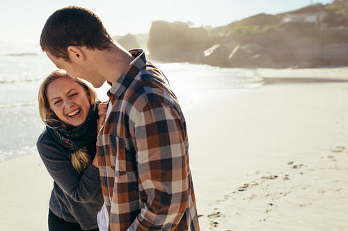 Loving couple having a great time at the beach
