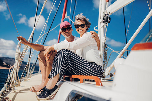 Senior couple having great time on yacht