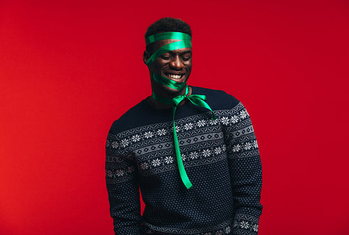 Man wrapped as a present