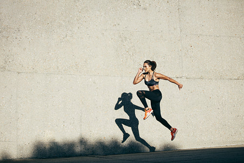 Fitness woman doing cardio exercise